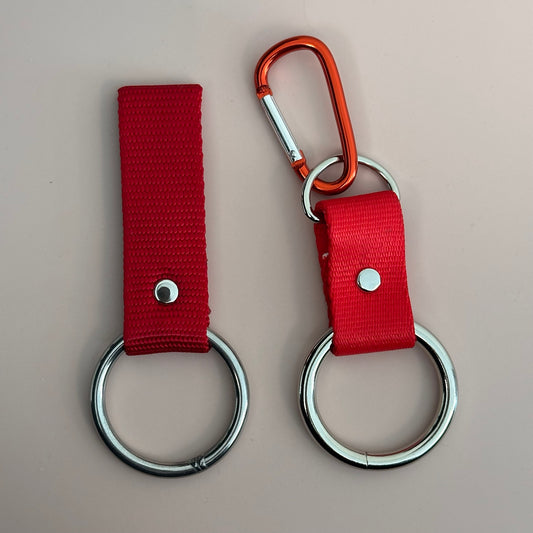 Bandana holder attachment styles: belt loop on the left and carabiner clip-on on the right