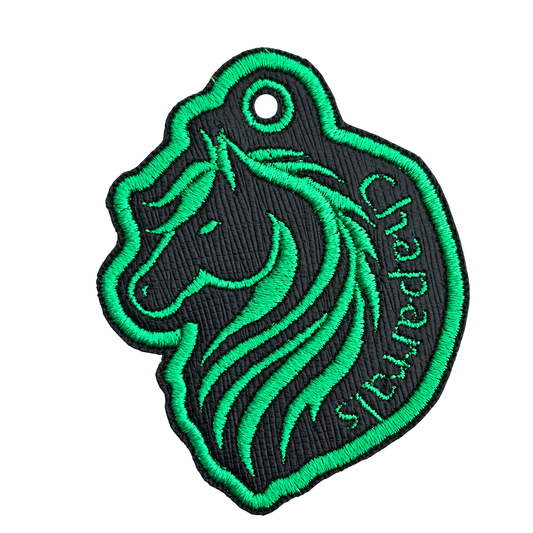 Chaparrals embroidered horse keychain, brightened photo with transparent background