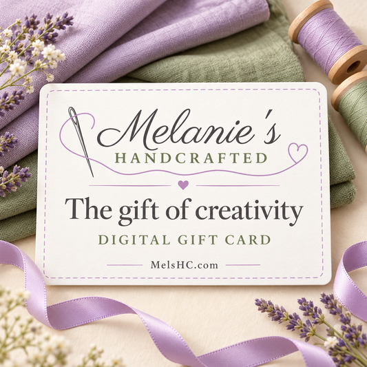 Melanie’s Handcrafted digital gift card with lavender ribbon, sage fabric, and the words The gift of creativity.